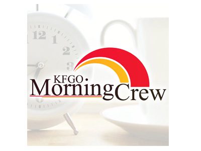 KFGO Morning Crew logo with clock and coffee cup background.